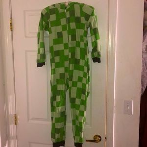 A Minecraft onsie with a box style design